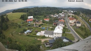 Obec Mikulovice - Pohled na Jeseniky - 1.8.2026 v 17:45 Obec Mikulovice - Pohled na Jeseniky - 1.8.2026 v 17:45