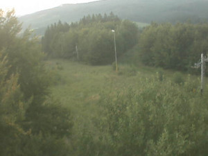 Skiareál Troják - Kamera na svahu B, pohled od chaty - 15.8.2025 v 05:49