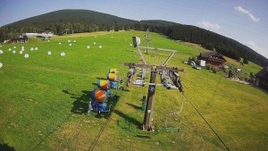 Bergattraktionen Ramzová - Unterer Teil der Skipiste im Skigebiet Ramzová - 31.7.2026 v 17:00 Bergattraktionen Ramzová - Unterer Teil der Skipiste im Skigebiet Ramzová - 31.7.2026 v 17:00
